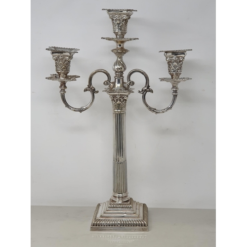 93 - A plated two branch Candelabra with leafage sconces, fluted column on stepped square base with gadro... 