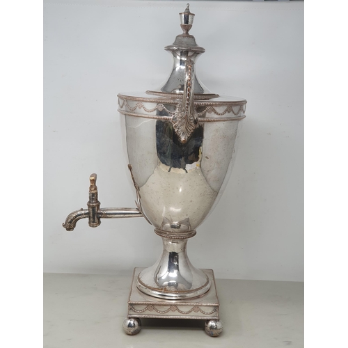 94 - A Georgian Sheffield plated Samovar of urn shape with swag frieze and engraved crest, leafage scroll... 