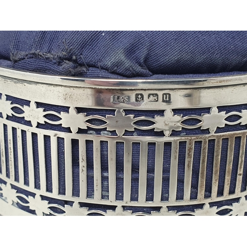 95 - A George V silver pierced circular Trinket Box with blue pin cushion lid, Birmingham 1912