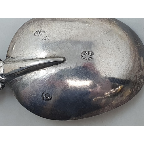 98 - Five Continental silver Spoons with ornate stems, one with import mark Sheffield 1896, 250gms