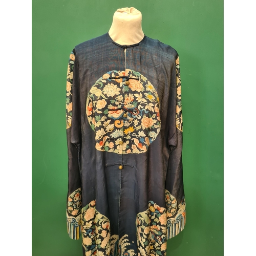 A Kossu/Kesi Robe with decoration of roundels with floral designs on a ...