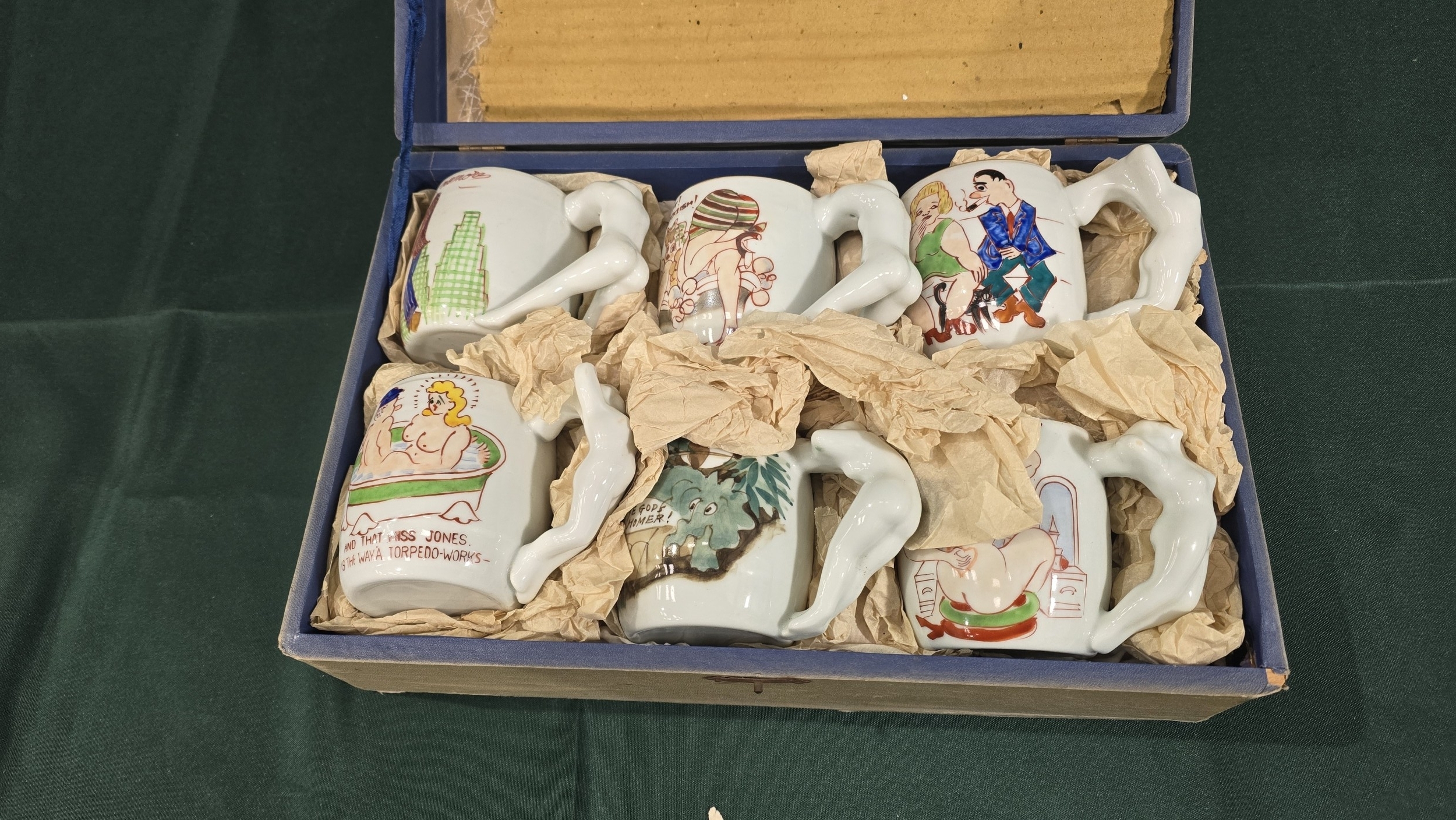 A set of six novelty Mugs with figural hands, (R6)