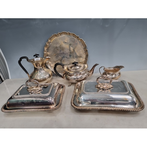 110 - Plated Items: Entree Dishes and Tea Service on a circular Tray