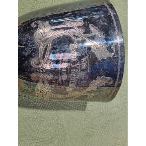 65 - A plated oval two handled Tea Tray, 28in and a plated Sporting Trophy