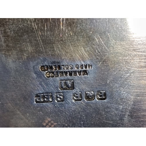 65 - A plated oval two handled Tea Tray, 28in and a plated Sporting Trophy