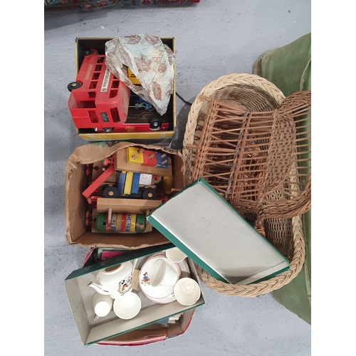 660 - A canvas covered Wicker Basket containing a box of playworn Diecast Models to include a Corgi Massey... 