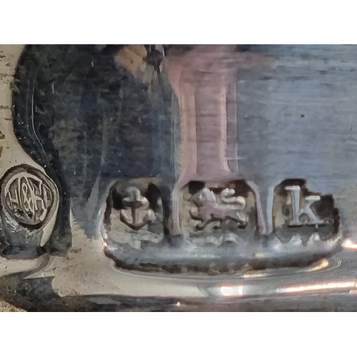 87 - A pair of George V silver mounted glass Spirit Flasks, Birmingham 1912, two silver Whisky Labels, a ... 