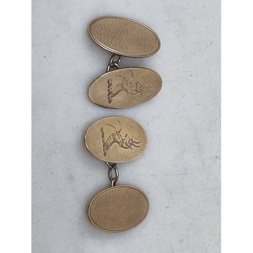 88 - A pair of 9ct gold oval Cuff Links engraved crest, Birmingham 1949, 6.6gms