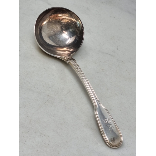 94 - A Victorian silver Sauce Ladle fiddle and thread pattern engraved initials and crest, London 1890, 7... 