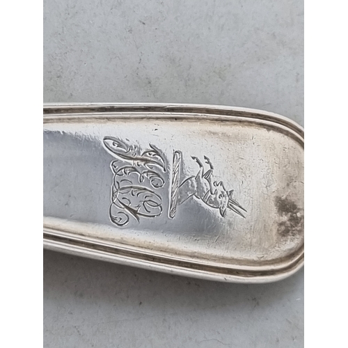 94 - A Victorian silver Sauce Ladle fiddle and thread pattern engraved initials and crest, London 1890, 7... 