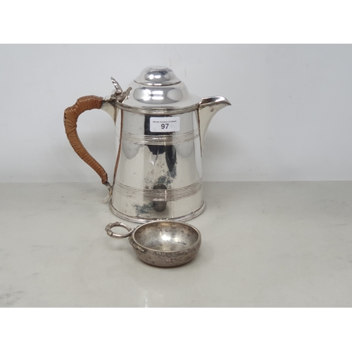 97 - A Continental white metal circular Wine Taster with serpent handle, and a plated Wine Jug with domed... 