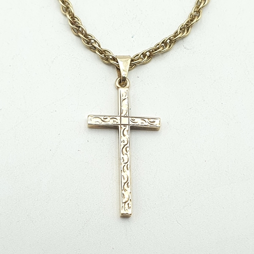 233 - A 9ct gold engraved Pendant Cross on a Prince of Wales link Chain stamped 9ct, approx 15.8gms