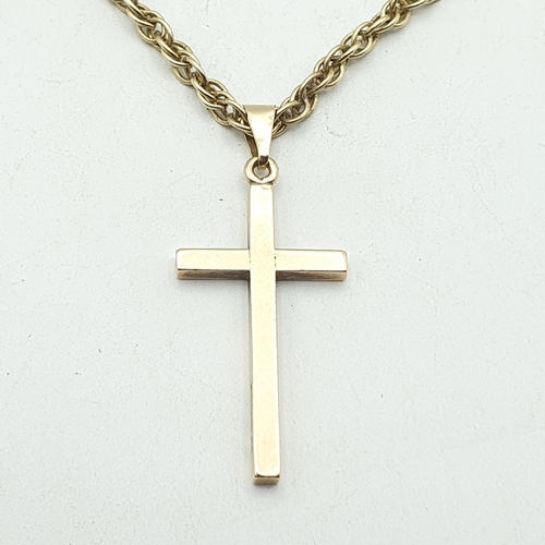 233 - A 9ct gold engraved Pendant Cross on a Prince of Wales link Chain stamped 9ct, approx 15.8gms