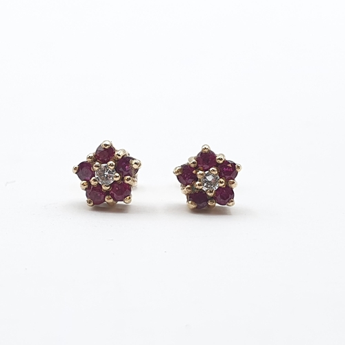 234 - A pair of Ruby and Diamond Cluster Earrings in 9ct gold, approx 1.8gms