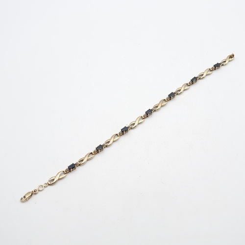 245 - A 9ct gold link Bracelet set sapphire and diamond, 18.5cm long, approx 5.1gms