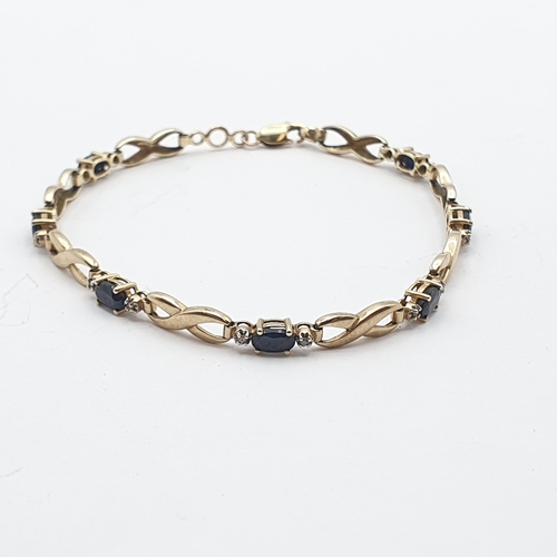 245 - A 9ct gold link Bracelet set sapphire and diamond, 18.5cm long, approx 5.1gms