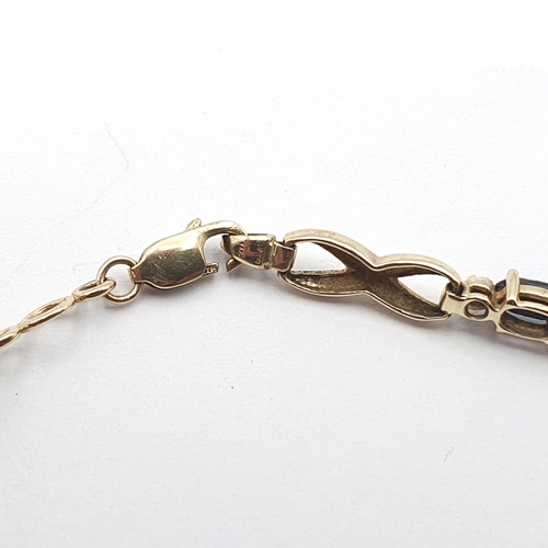 245 - A 9ct gold link Bracelet set sapphire and diamond, 18.5cm long, approx 5.1gms