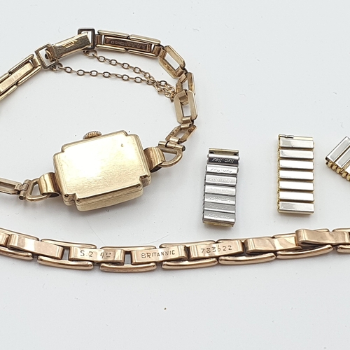 251 - A Lady's Primula Wristwatch the square dial with Arabic numerals in 9ct gold case on 9ct gold rectan... 