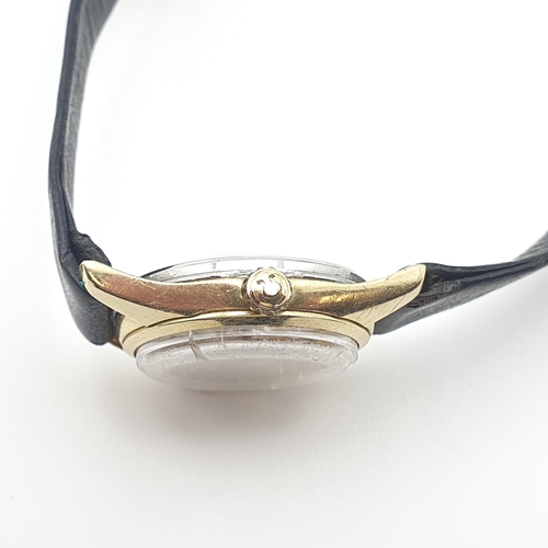 252 - OMEGA. An Omega 'Ladymatic' Seamaster Wristwatch the silvered dial with hourly baton markers in gold... 