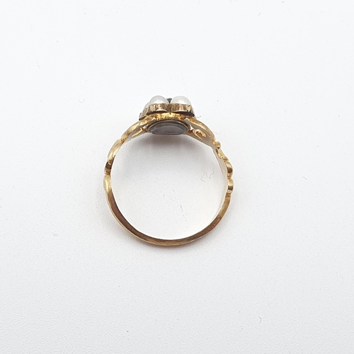 256 - A Victorian Cluster Ring set rose-cut diamond within five seed pearls, woven hair to reverse in scol... 