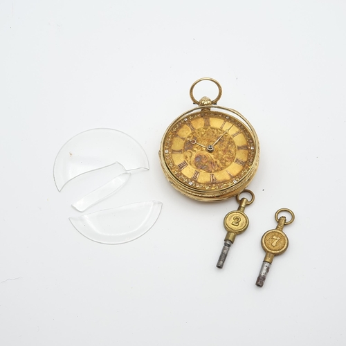 259 - A Victorian 18ct gold cased open faced Pocket Watch the floral engraved dial with Roman numerals in ... 