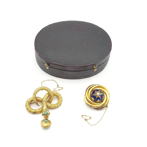 264 - A Victorian Target Brooch with blue enamel set split pearl to centre, woven hair enclosed verso and ... 