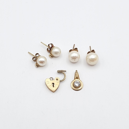269 - A pair of Cultured Pearl Stud Earrings on yellow metal posts, a further pair of Cultured Stud Earrin... 