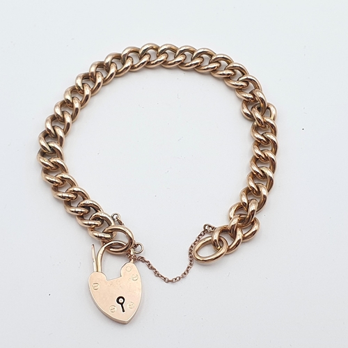 277 - A 9ct rose gold curb link Bracelet with padlock fastener, approx 11.2gms