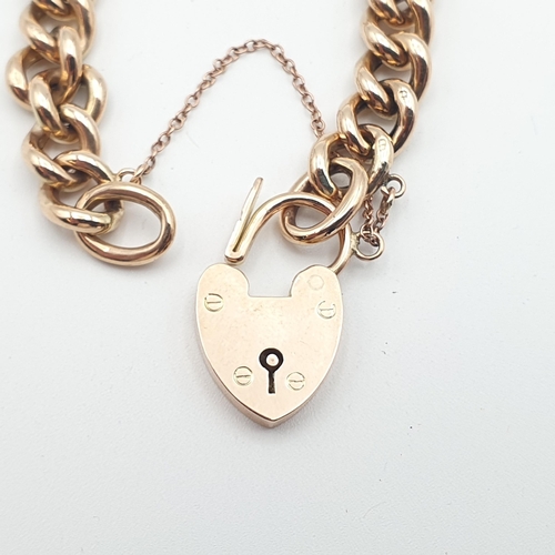 277 - A 9ct rose gold curb link Bracelet with padlock fastener, approx 11.2gms
