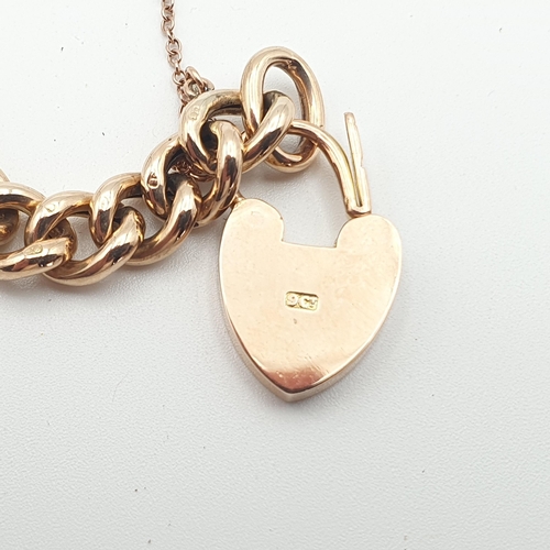 277 - A 9ct rose gold curb link Bracelet with padlock fastener, approx 11.2gms