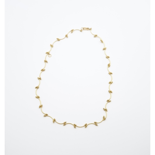 280 - A fancy chain Necklace of wirework design, appears to be stamped 14K, length 46cm, approx 11.4gms