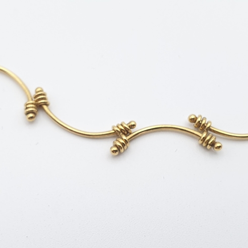 280 - A fancy chain Necklace of wirework design, appears to be stamped 14K, length 46cm, approx 11.4gms