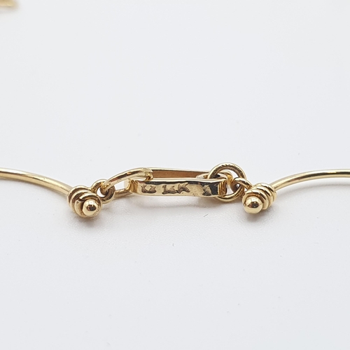 280 - A fancy chain Necklace of wirework design, appears to be stamped 14K, length 46cm, approx 11.4gms