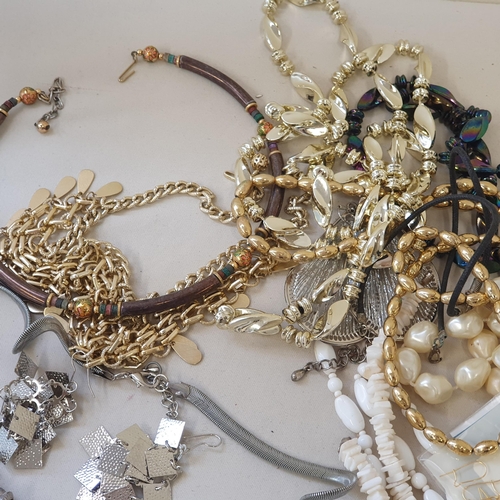 284 - A collection of Costume Jewellery and a wooden Jewel Box