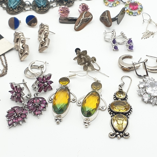 287 - A silver curb link Bracelet with numerous charms, a scarab type Bracelet and a collection of mostly ... 