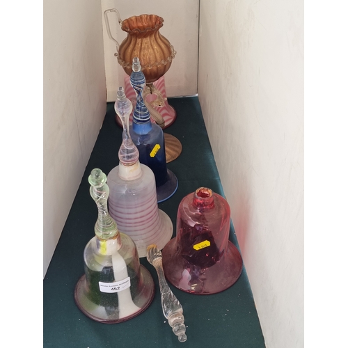452 - Five various coloured glass Bells, one A/F, a coloured glass Candle Holder with sphinx type support,... 