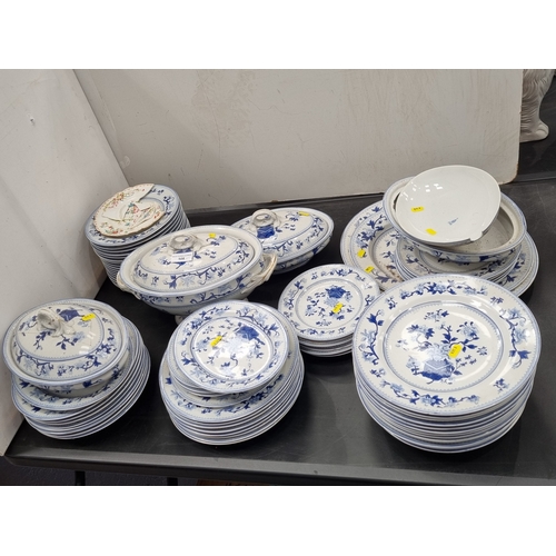 508 - A large Royal Worcester Dinner Service decorated jardinieres with flowers in blue and white, some A/... 