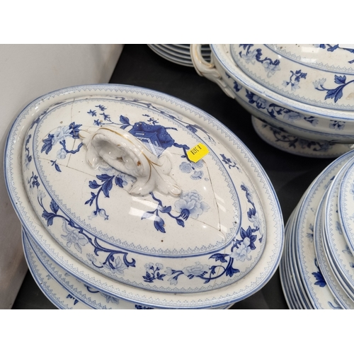 508 - A large Royal Worcester Dinner Service decorated jardinieres with flowers in blue and white, some A/... 
