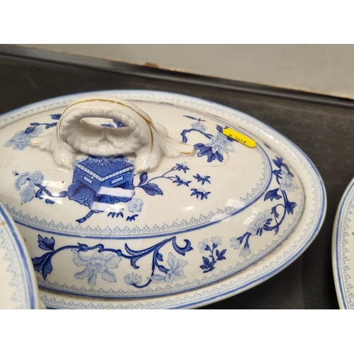 508 - A large Royal Worcester Dinner Service decorated jardinieres with flowers in blue and white, some A/... 