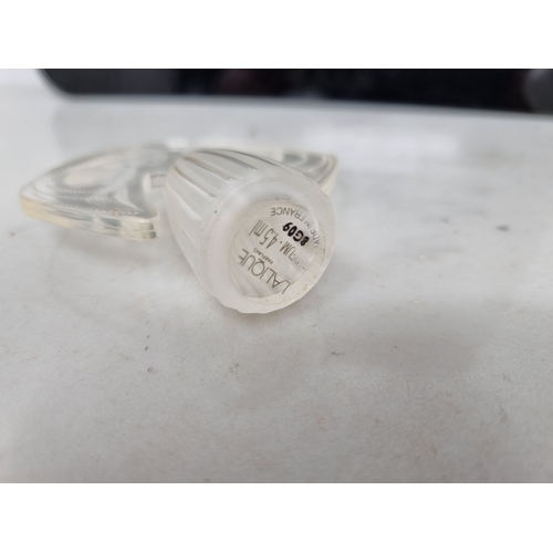 49 - Three modern Lalique glass Scent Bottles and Stoppers