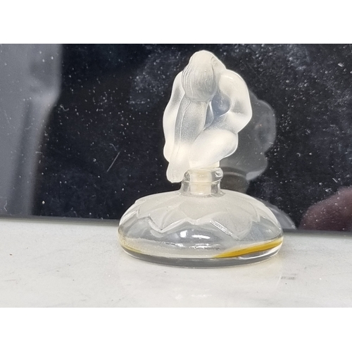 49 - Three modern Lalique glass Scent Bottles and Stoppers