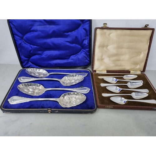 54 - A set four plated Fruit Spoons with berry embossed bowls and engraved initial, and six plated Grapef... 