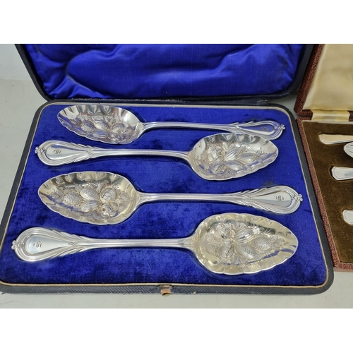 54 - A set four plated Fruit Spoons with berry embossed bowls and engraved initial, and six plated Grapef... 