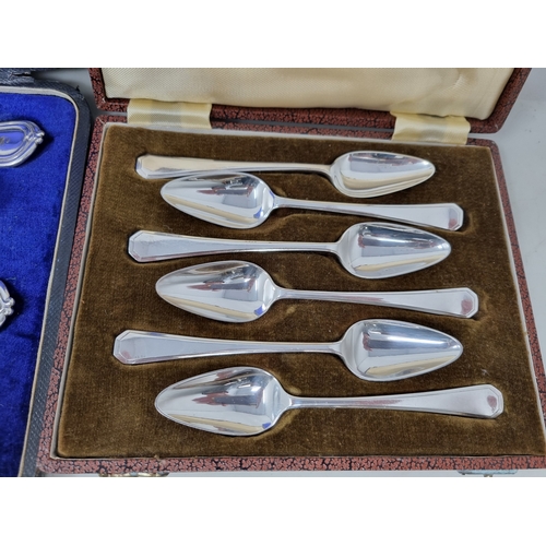54 - A set four plated Fruit Spoons with berry embossed bowls and engraved initial, and six plated Grapef... 
