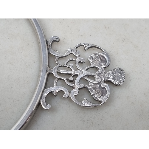 60 - Two Victorian silver Porringer Mounts with pierced cherub handles, London 1897, and a sterling silve... 