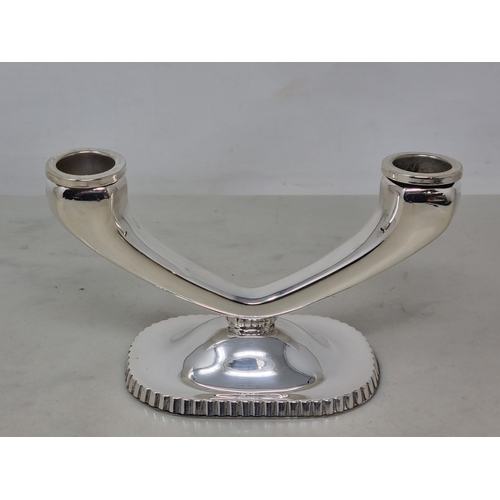 61 - A sterling silver two branch Candlestick on oblong base
