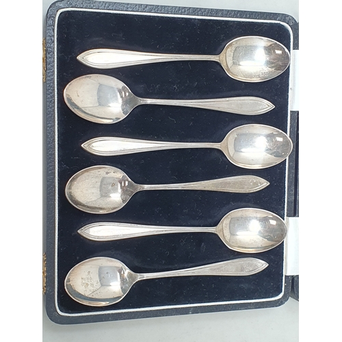 71 - Six George V silver Teaspoons, Birmingham 1932, 63gms, in case