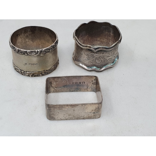 74 - An Edward VII silver Napkin Ring scroll engraved, Chester 1908,another, Chester 1902,and another, Bi... 