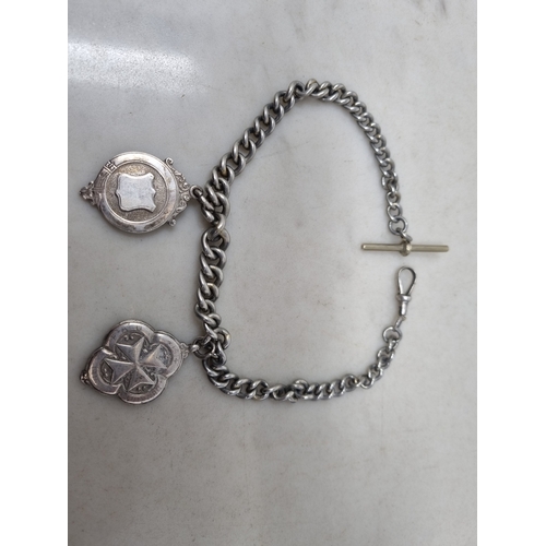 75 - A graduated chain link Watch Albert and two silver Medallions