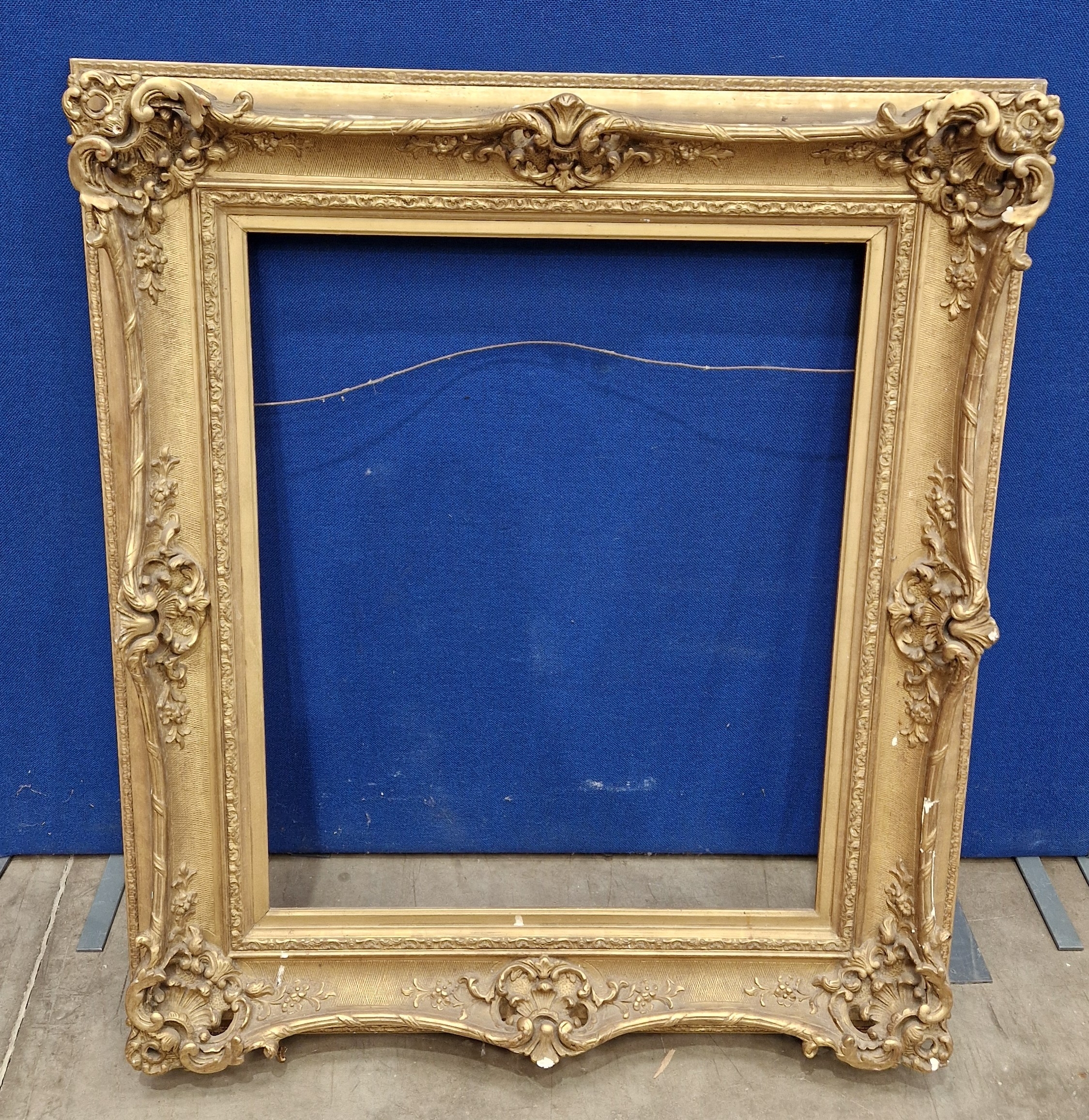 A Giltwood and composition Picture frame, inset size, 29 1/4 x 24 1/2 ...